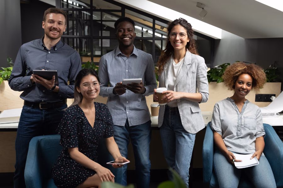 People smiling in an office space